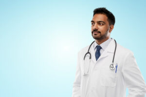 indian male doctor with stethoscope